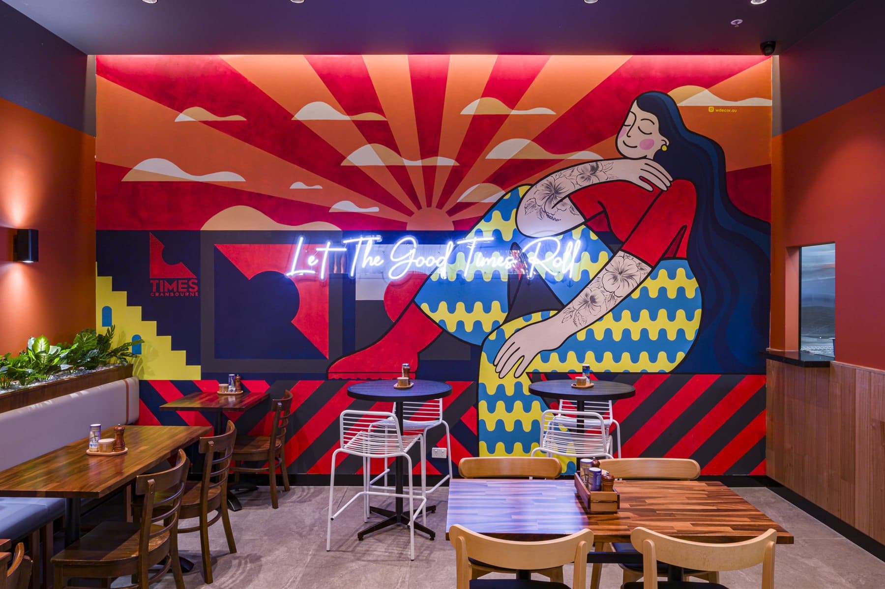 The colourful mural dining room at Times Cafe Cranbourne